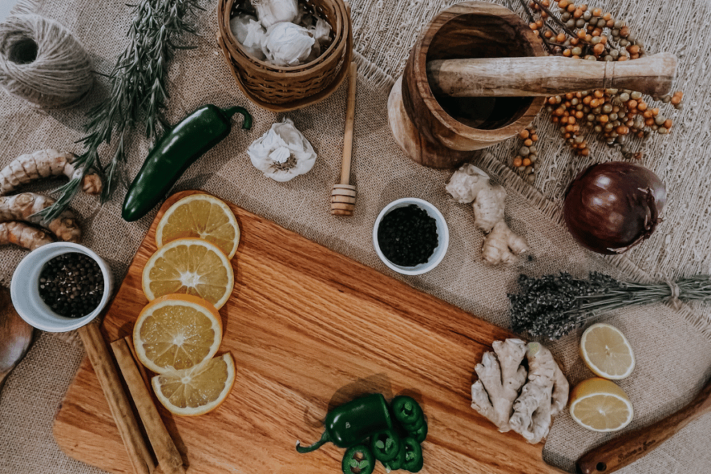 prepping ingredients on cutting board to make fire cider